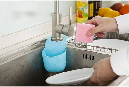 Hanging Silicone Sink Caddy - for Kitchen or Bath, Hangs from Faucet, Helps Dry Sponges, Loofahs, Razors, Soap (1 Pack, Pastel Blue)